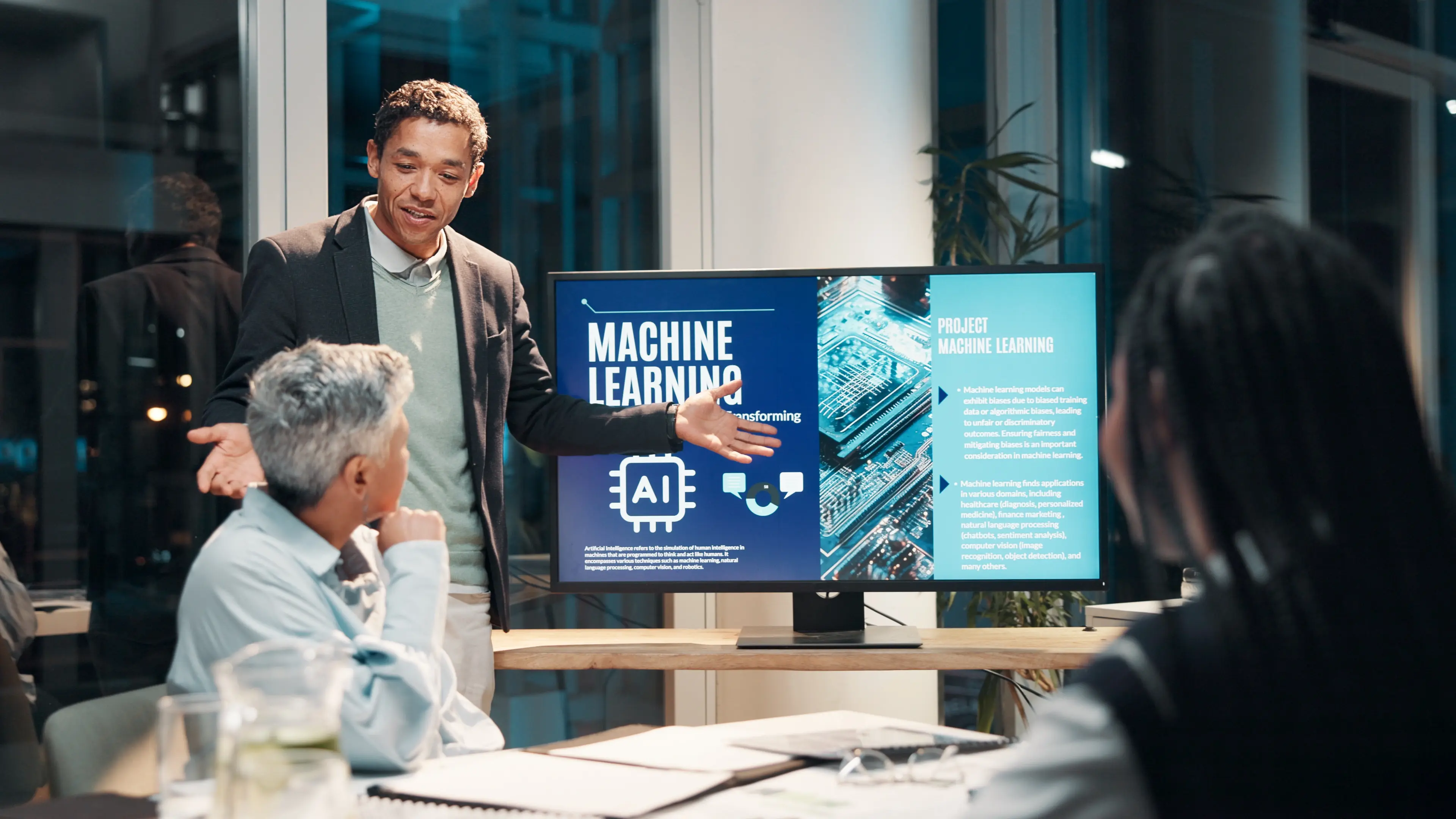 Presenter leading an AI training for employees session on machine learning in a modern office.